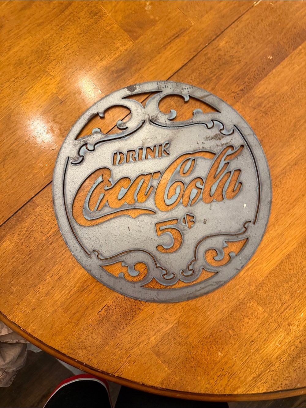 Coca-Cola Round Cast Iron Trivet in Gray with Orange Accents